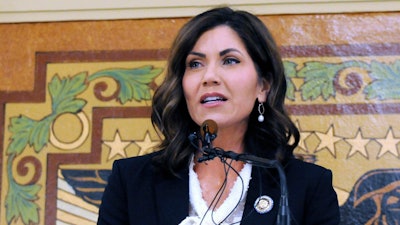 In this Jan. 2019 file photo, South Dakota Gov. Kristi Noem speaks in Pierre, S.D. Noem signed a bill that revives the state's criminal and civil penalties for rioting and inciting a riot.