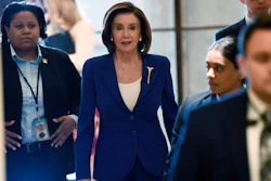 House Speaker Nancy Pelosi of Calif., arrives on Capitol Hill in Washington on Friday, March 27.