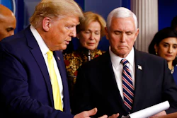 President Donald Trump gestures for Vice President Mike Pence to speaks in the briefing room of the White House in Washington, Monday, March 9, 2020, about the coronavirus outbreak.