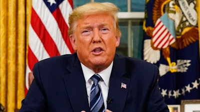 President Donald Trump speaks in an address to the nation from the Oval Office at the White House about the coronavirus Wednesday, March, 11, 2020, in Washington.