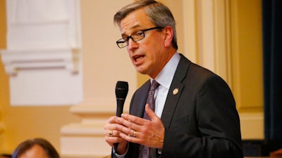 Del. Richard 'Rip' Sullivan, D-Arlington, gestures during the House session at the Capitol Thursday, March. 5, 2020, in Richmond, Va. Sullivan is leading the floor debate on the renewable energy bills.