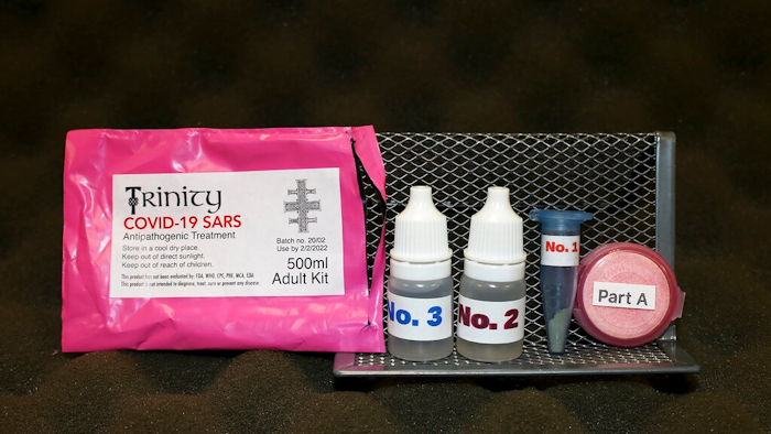 This undated photo provided by the U.S. Attorney's Office shows a phony coronavirus cure that a British man tried to smuggle into the United States. Con artists are finding lots of marks amid the COVID-19 pandemic. Watchdog groups and authorities report a surge of complaints about scams targeting people who fear catching the virus or need money due to lost income.
