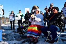 In this Oct. 29, 2019 file photo, opponents of the Keystone XL oil pipeline from Canada demonstrate in sub-freezing temperatures in Billings, Mont.