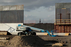 In this Nov. 7, 2019, file photo, the first panels of levee border wall are seen at a construction site along the U.S.-Mexico border, in Donna, Texas.