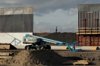 In this Nov. 7, 2019, file photo, the first panels of levee border wall are seen at a construction site along the U.S.-Mexico border, in Donna, Texas.