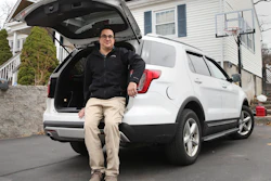 Tim Miranda, a software company manager currently working from home during the coronavirus outbreak, sits in his vehicle outside his Chelmsford, Mass. home, Thursday, April 2, 2020.