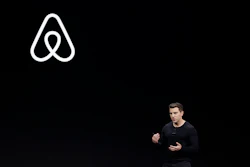 Airbnb co-founder and CEO Brian Chesky speaks during an event in San Francisco.