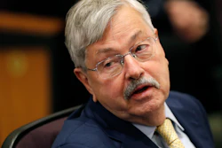 U.S. Ambassador to China Terry Branstad listens to Secretary of State Mike Pompeo speak at an event in Johnston, Iowa.