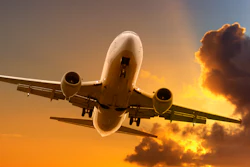 Jet Aeroplane Flying In Bright Sunset Sky Sun Rays 000009760454 Medium