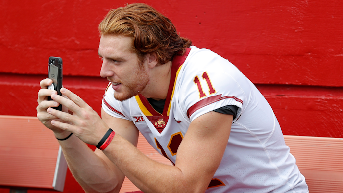 In this Aug. 7, 2018, file photo, Iowa State tight end Chase Allen takes a photo with his cell phone during Iowa State's annual NCAA college football media day in Ames, Iowa.
