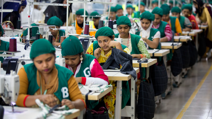In this April 19, 2018 file photo, trainees work at Snowtex garment factory in Dhamrai, near Dhaka, Bangladesh.