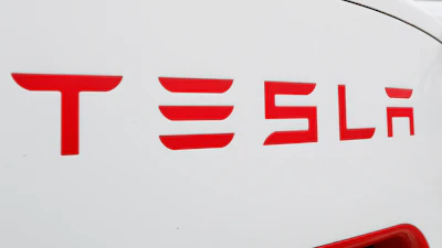 This Wednesday, March 18, 2020, file photo, shows a Tesla charging station for automobiles in Port Huron, Mich.