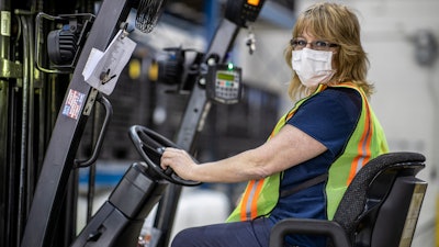 Cindy Parkhurst working at the Ford Flat Rock Assembly Plant in Flat Rock, Mich.
