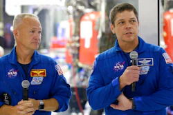 In this Thursday, Oct. 10, 2019 file photo, NASA astronauts Bob Behnken, right, and Doug Hurley talk to the media in front of the Crew Dragon spacecraft at SpaceX headquarters in Hawthorne, Calif. On Friday, April 17, 2020, NASA and SpaceX announced May 27 for resuming human launches from the U.S. after nearly a decade. Hurley and Behnken will blast off atop a SpaceX Falcon 9 rocket, departing from the same Kennedy Space Center launch pad used by Atlantis in July 2011.