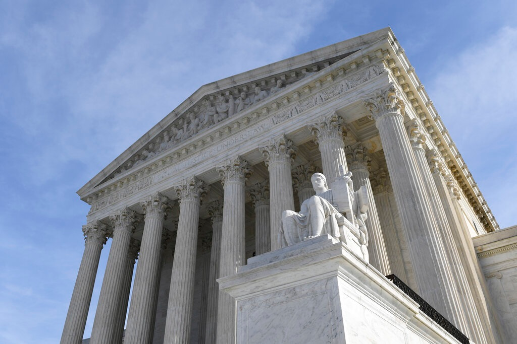 In this Nov. 11, 2019 file photo, a view of the Supreme Court in Washington. The Supreme Court has delivered a setback to Montana homeowners who are seeking additional cleanup of arsenic left over from years of copper smelting. The court said Monday that the homeowners cannot proceed with efforts to decontaminate their own property near the shuttered Anaconda smelter without the permission of the Environmental Protection Agency.