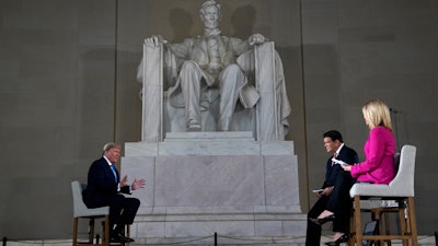 President Donald Trump speaks during a Fox News virtual town hall from the Lincoln Memorial on Sunday in Washington, co-moderated by FOX News anchors Bret Baier and Martha MacCallum.