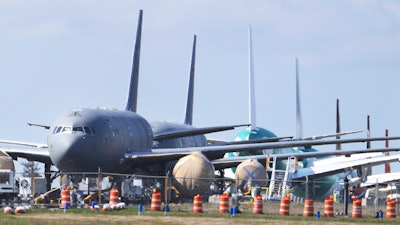 U.S. Air Force KC-46 tankers being built by Boeing sit parked at the Paine Field airport in Everett, Wash.
