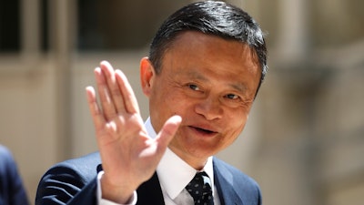 Founder of Alibaba group Jack Ma arrives for the Tech for Good summit in Paris.