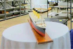 In this Feb. 18, 2020 file photo, artifacts recovered from the Titanic sit on shelves at a storage facility in Atlanta. A federal judge in Virginia has ruled that a salvage firm can retrieve the Marconi wireless telegraph machine that broadcast distress calls from the sinking Titanic ocean liner. In an order released Monday, May 18, U.S. District Judge Rebecca Beach Smith agreed that the telegraph is historically and culturally important and could soon be lost within the rapidly decaying wreck site.