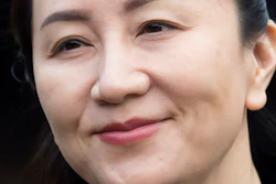 Huawei CFO Meng Wanzhou leaves her home to attend a hearing in British Columbia Supreme Court, Vancouver, Jan. 21, 2020.