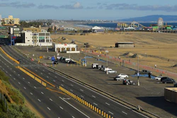In this March 23, 2020 file photo, light traffic and a mostly empty parking lot is seen along Pacific Coast Highway, in Santa Monica, Calif. 2020. The U.S. government is estimating that traffic deaths fell 1.2% last year to 36,120. The National Highway Traffic Safety Administration says it’s the third year in a row that fatalities dropped.