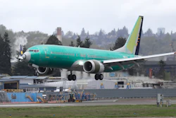 A Boeing 737 Max 8 airplane lands following a test flight at Boeing Field in Seattle, April 10, 2019.