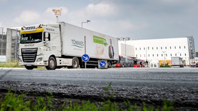 A truck leaves the Toennies meatpacking plant.