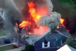 In this image taken from video provided by WCVB in Boston, flames consume a home of Lawrence, Mass., Sept. 13, 2018.