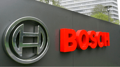 Logo of the Robert Bosch GmbH in front of the company's headquarters.