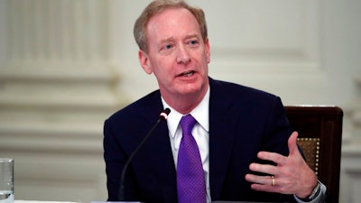 In this May 29, 2020 file photo, Brad Smith, president of Microsoft, speaks during a roundtable with industry executives about reopening country after the coronavirus closures, in the State Dining Room of the White House, in Washington. Microsoft has become the third big tech company this week to say it won’t sell its facial recognition software to police, following similar moves by Amazon and IBM. Smith, announced the decision and called for Congress to regulate the technology during a Washington Post video event on Thursday, June 11.