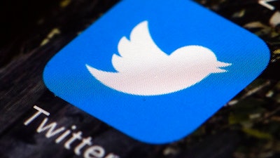 This April 26, 2017, file photo shows the Twitter app icon on a mobile phone in Philadelphia. A tech-focused civil liberties group on Tuesday, June 2, 2020, sued to block President Donald Trump's executive order that seeks to regulate social media, saying it violates the First Amendment and chills speech. Trump's order, signed in late May, could allow more lawsuits against internet companies like Twitter and Facebook for what their users post, tweet and stream.