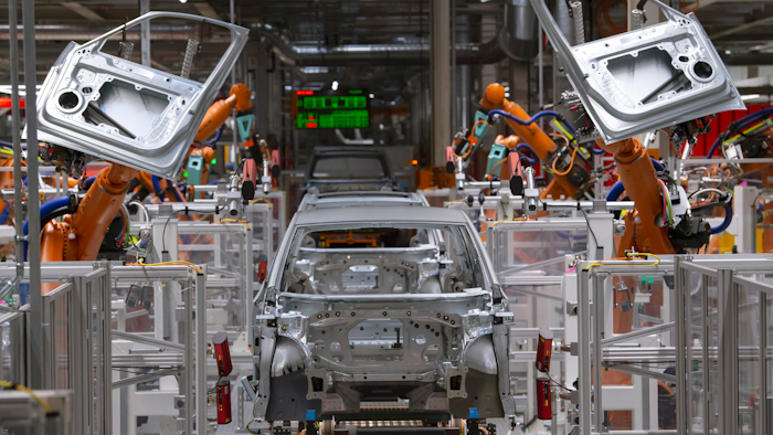 Robots work on an electric car.