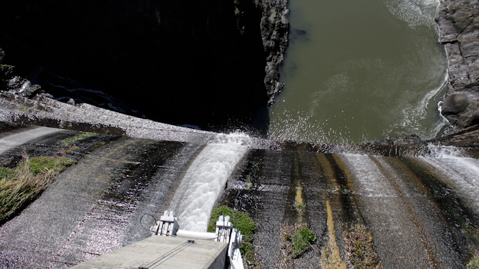 Excess water spills over the top of a dam on the lower Klamath River.