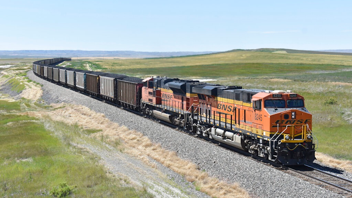 A BNSF Railway train hauling carloads of coal from the Powder River Basin of Montana and Wyoming is seen east of Hardin, Mont., on July 15, 2020. A coalition of states is renewing its push to stop the Trump administration from selling coal from public lands.
