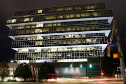 Cars pass Purdue Pharma headquarters.