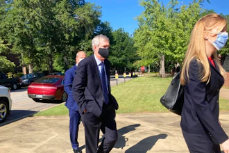 Former SCANA Corp. Senior Vice President Stephen Byrne enters the Matthew J. Perry, Jr. Courthouse in Columbia, S.C. to enter a guilty plea to one count of conspiracy to commit mail and wire fraud Thursday, July 23, 2020. Byrne agreed to cooperate with prosecutors in a federal investigation into the failed V.C. Summer nuclear project in South Carolina.
