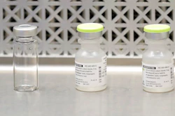 This March 16, 2020 file photo shows vials used by pharmacists to prepare syringes used on the first day of a first-stage safety study clinical trial of the potential vaccine for COVID-19, the disease caused by the new coronavirus, at the Kaiser Permanente Washington Health Research Institute in Seattle. The world's biggest COVID-19 vaccine test got underway Monday, July 27 with the first of 30,000 planned volunteers. The experimental vaccine is made by the National Institutes of Health and Moderna Inc., and it's one of several candidates in the final stretch of the global vaccine race.