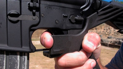 An AR-15 rifle fitted with a 'bump stock.'