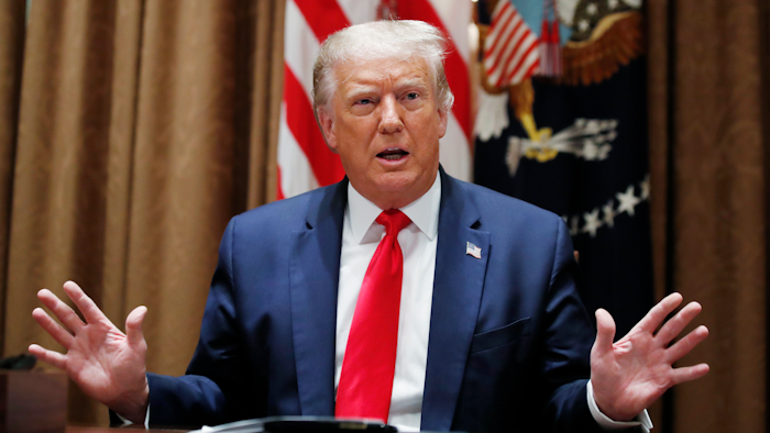 President Donald Trump speaks during a meeting with U.S. tech workers.