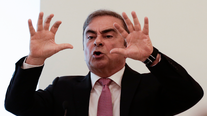 Nissan's former executive Carlos Ghosn speaks at a press conference.