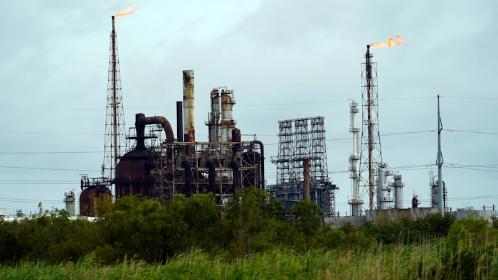Winds blow the flames at refinery on Wednesday, Aug. 26 in Port Arthur, TX.