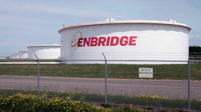 Tanks stand at the Enbridge Energy terminal.