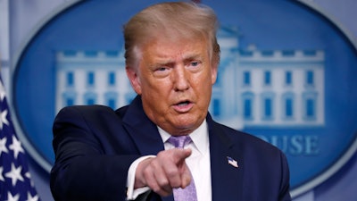 President Donald Trump speaks during a briefing.