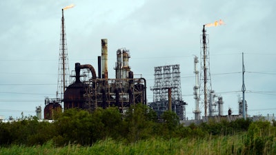 Winds blow the flames at refinery on Wednesday, Aug. 26 in Port Arthur, TX.