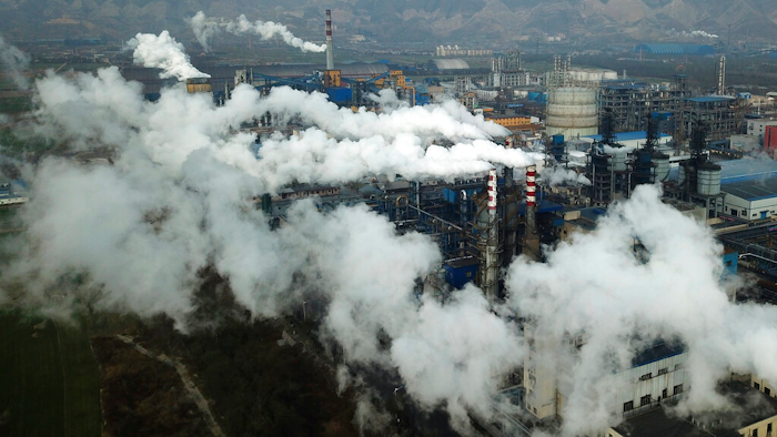 Smoke and steam rise from a coal processing plant in Hejin in central China's Shanxi Province.