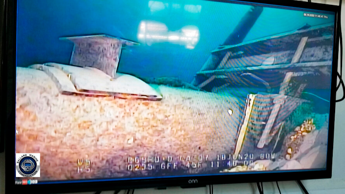 Shot from a television screen shows damage to anchor support EP-17-1 on the east leg of the Enbridge Line 5 pipeline within the Straits of Mackinac in Michigan.