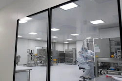 Laboratory technicians work at the mAbxience biopharmaceutical company on an experimental coronavirus vaccine developed by Oxford University and AstraZeneca, Garin, Argentina, Aug. 14, 2020.