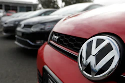 Cars parked at a Volkswagen dealership in Sydney, Sept. 16, 2019.