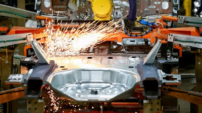 Machines work on a vehicle assembly line at Ford's Chicago Assembly Plant, June 24, 2019.