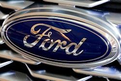 Ford logo on the grill of a 2018 Ford Explorer.